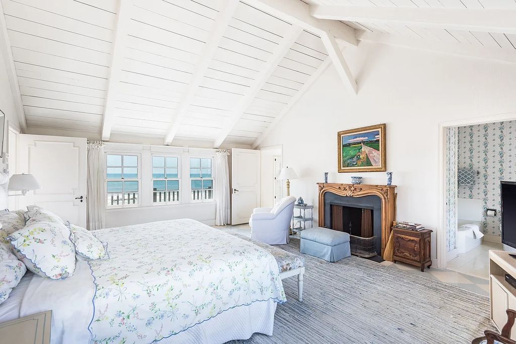 The House in East Hampton includes oceanside pool, extensive terraces and second floor deck taking full advantage of the panoramic views now available for sale. This home located at 201 Lily Pond Ln, East Hampton, New York