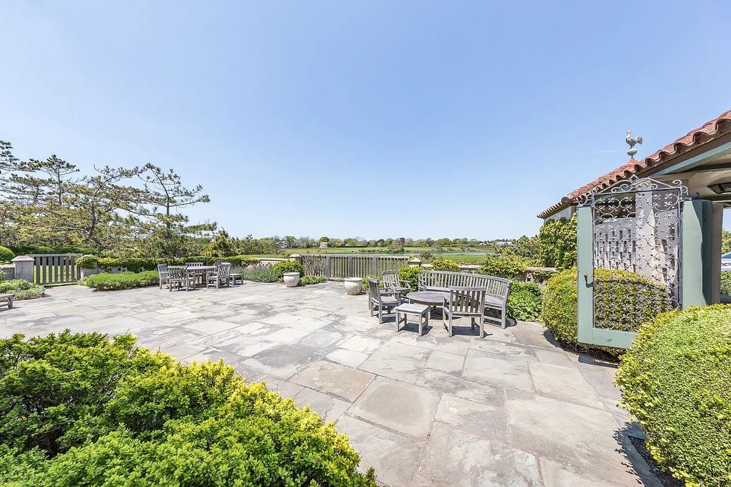 The House in East Hampton includes oceanside pool, extensive terraces and second floor deck taking full advantage of the panoramic views now available for sale. This home located at 201 Lily Pond Ln, East Hampton, New York