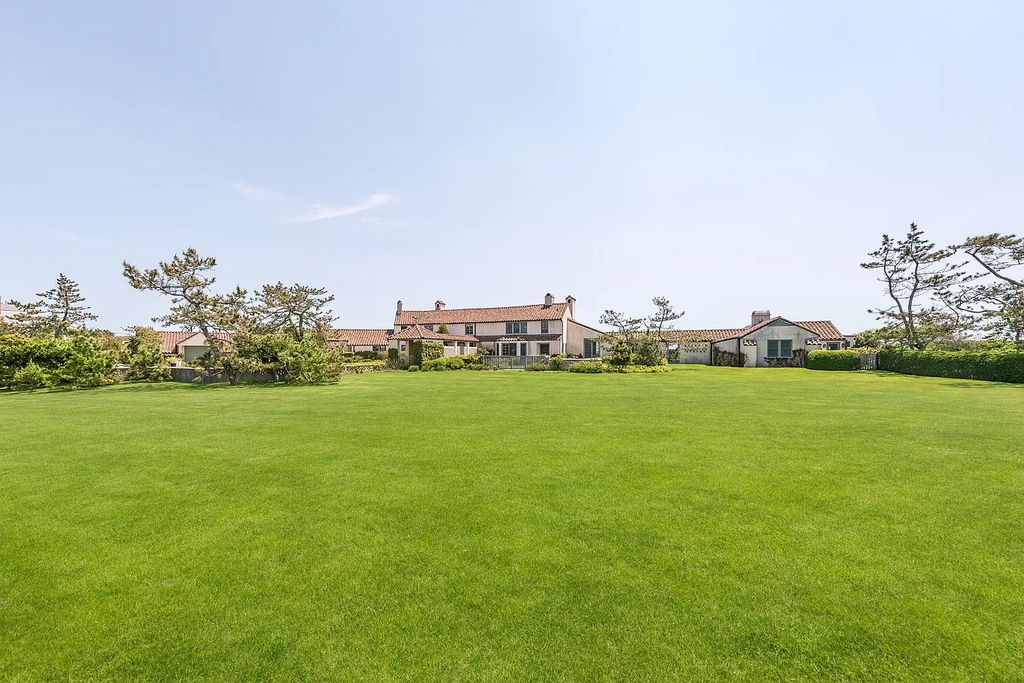 The House in East Hampton includes oceanside pool, extensive terraces and second floor deck taking full advantage of the panoramic views now available for sale. This home located at 201 Lily Pond Ln, East Hampton, New York