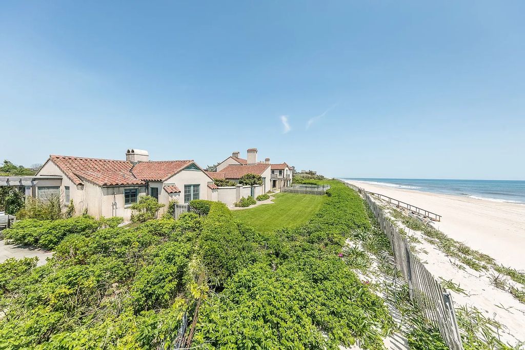 The House in East Hampton includes oceanside pool, extensive terraces and second floor deck taking full advantage of the panoramic views now available for sale. This home located at 201 Lily Pond Ln, East Hampton, New York