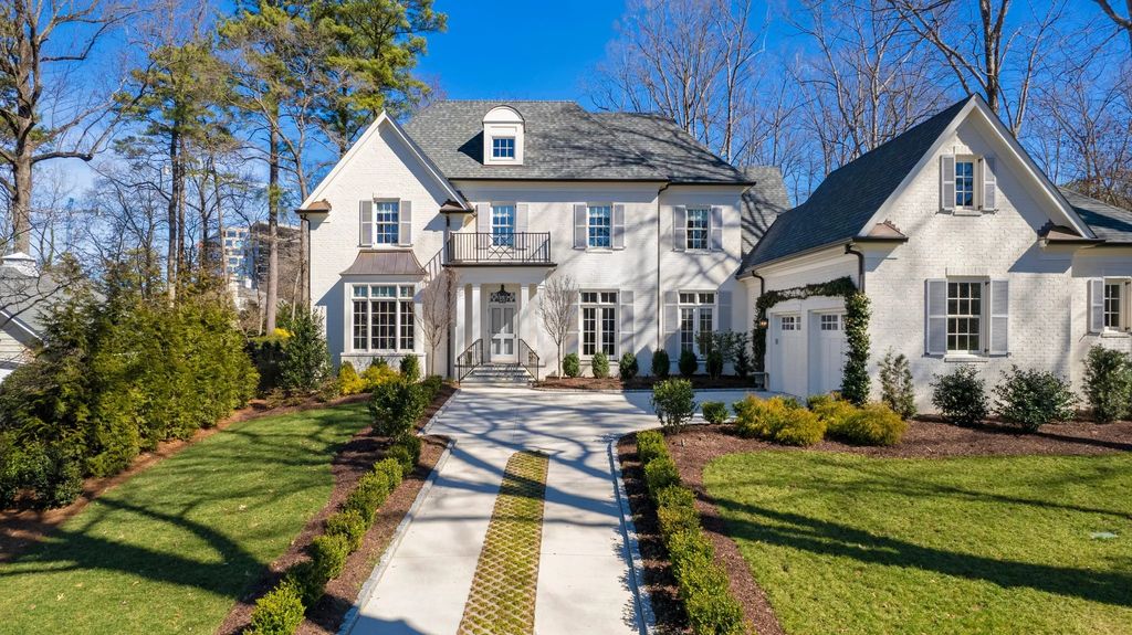 The House in Raleigh has large, beautifully landscaped back yard includes privacy fence, slate patio, and wood-burning fireplace with sitting area, now available for sale. This home located at 3910 Stratford Ct, Raleigh, North Carolina