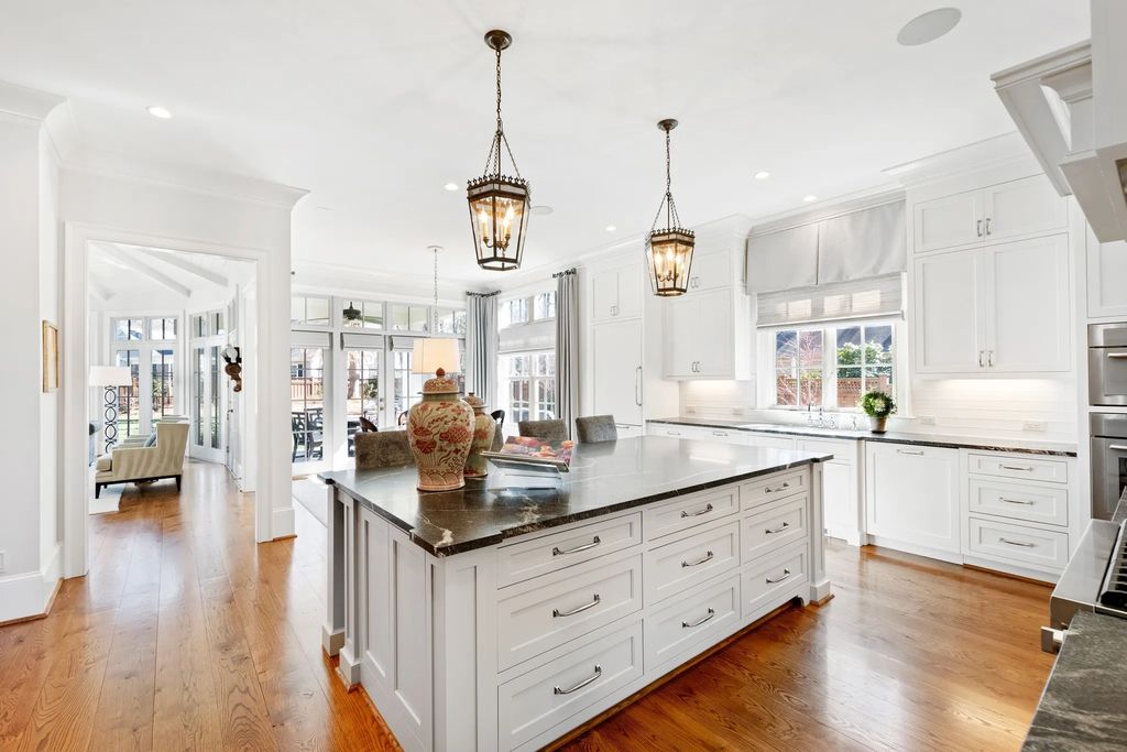 The House in Raleigh has large, beautifully landscaped back yard includes privacy fence, slate patio, and wood-burning fireplace with sitting area, now available for sale. This home located at 3910 Stratford Ct, Raleigh, North Carolina