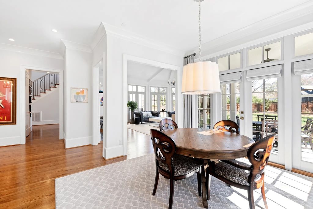 The House in Raleigh has large, beautifully landscaped back yard includes privacy fence, slate patio, and wood-burning fireplace with sitting area, now available for sale. This home located at 3910 Stratford Ct, Raleigh, North Carolina