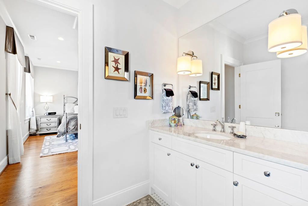 The House in Raleigh has large, beautifully landscaped back yard includes privacy fence, slate patio, and wood-burning fireplace with sitting area, now available for sale. This home located at 3910 Stratford Ct, Raleigh, North Carolina
