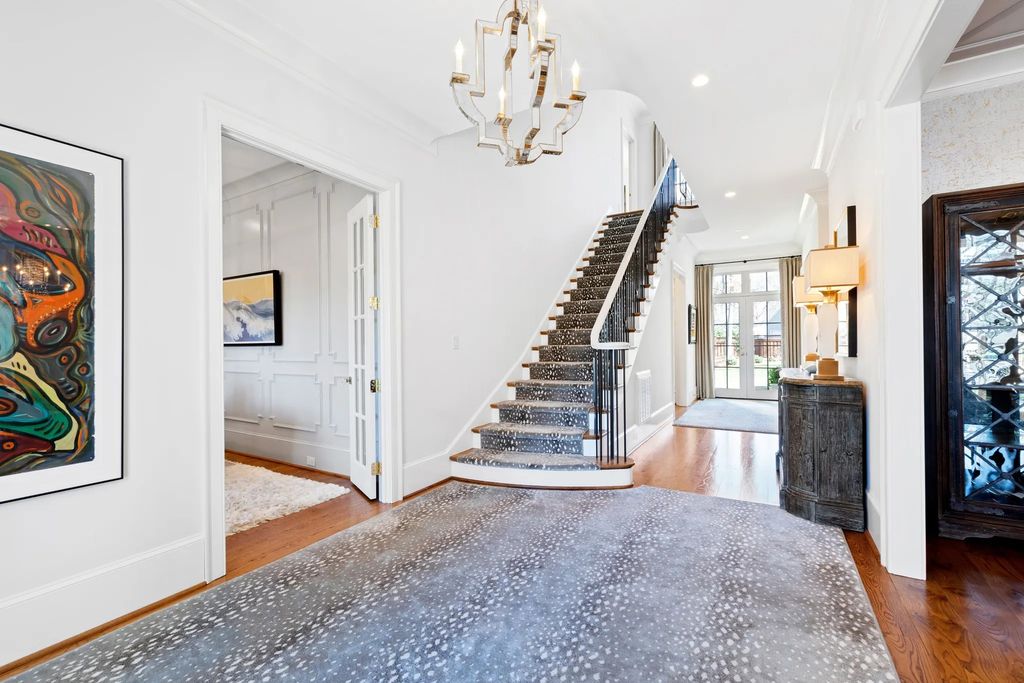 The House in Raleigh has large, beautifully landscaped back yard includes privacy fence, slate patio, and wood-burning fireplace with sitting area, now available for sale. This home located at 3910 Stratford Ct, Raleigh, North Carolina