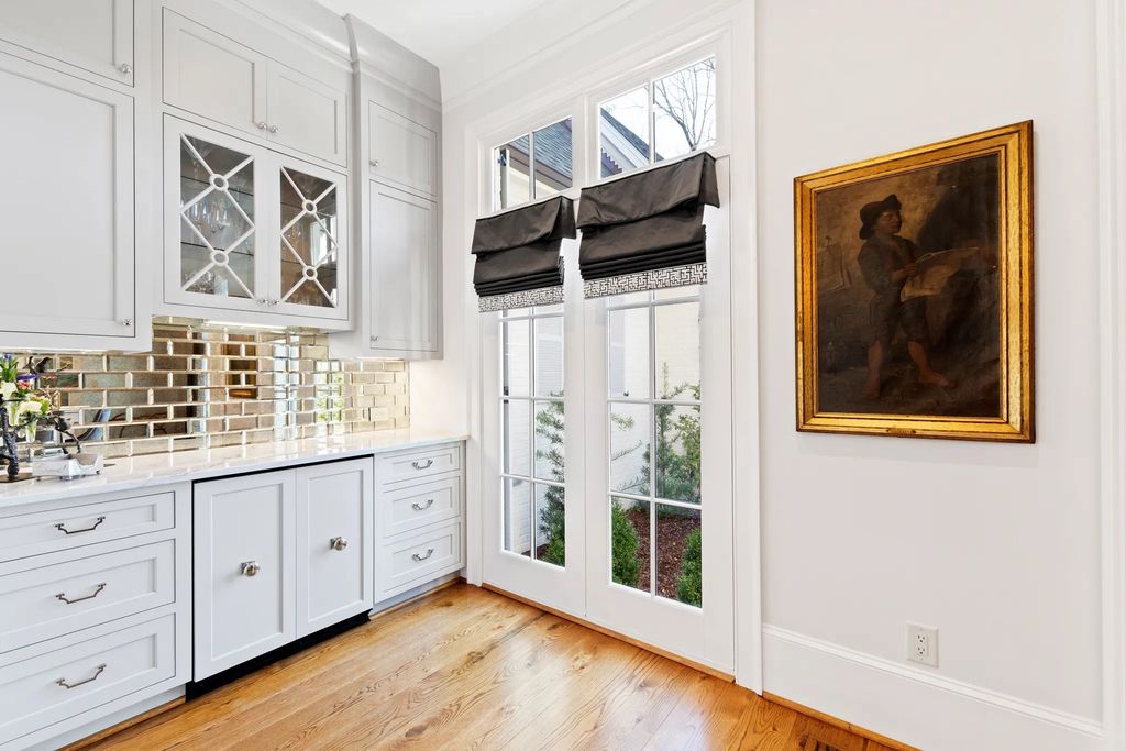 The House in Raleigh has large, beautifully landscaped back yard includes privacy fence, slate patio, and wood-burning fireplace with sitting area, now available for sale. This home located at 3910 Stratford Ct, Raleigh, North Carolina
