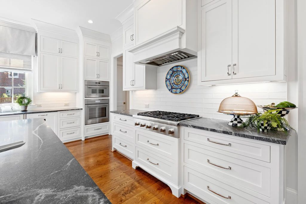 The House in Raleigh has large, beautifully landscaped back yard includes privacy fence, slate patio, and wood-burning fireplace with sitting area, now available for sale. This home located at 3910 Stratford Ct, Raleigh, North Carolina