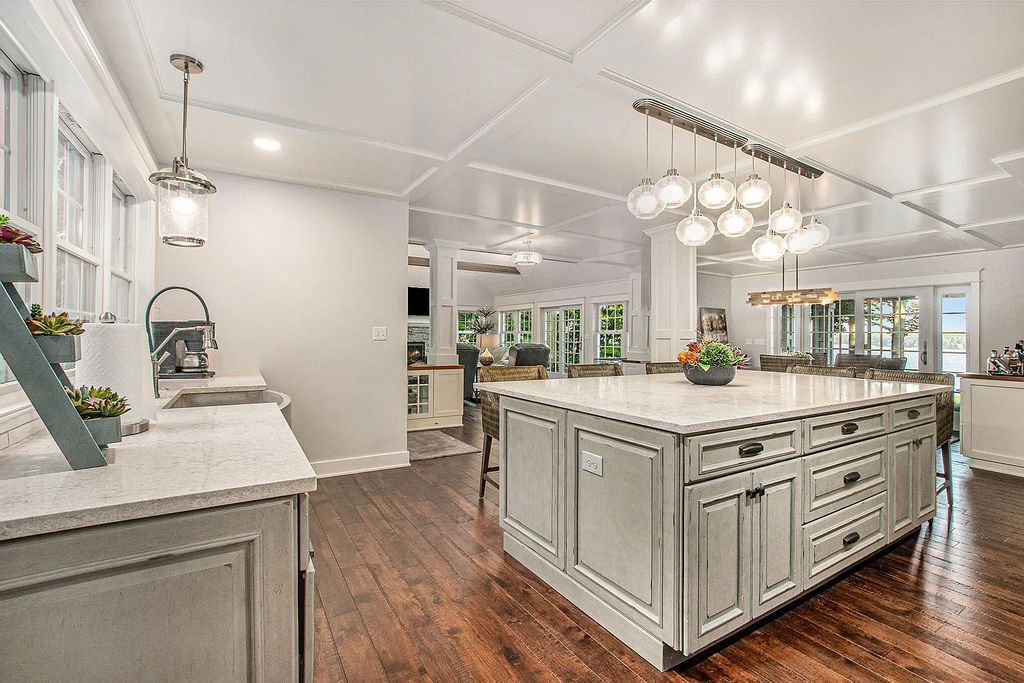 The Estate in Whitehall is a luxurious home thoughtfully planned and designed with high-end upgrades and installs throughout now available for sale. This home located at 5916 S Shore Dr, Whitehall, Michigan; offering 04 bedrooms and 03 bathrooms with 3,001 square feet of living spaces.