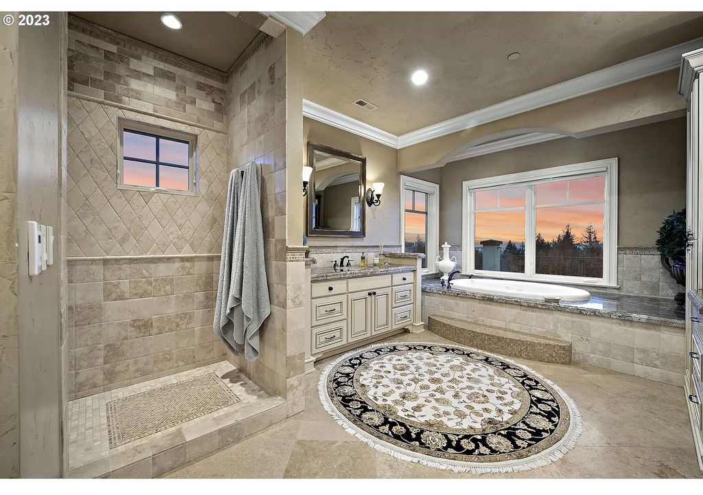 The Estate in Portland is a luxurious home featuring rich amenities, large living spaces and soaring ceilings to offer spectacular sunset and panoramic views now available for sale. This home located at 12955 NW Skyline Blvd, Portland, Oregon; offering 04 bedrooms and 05 bathrooms with 7,956 square feet of living spaces.