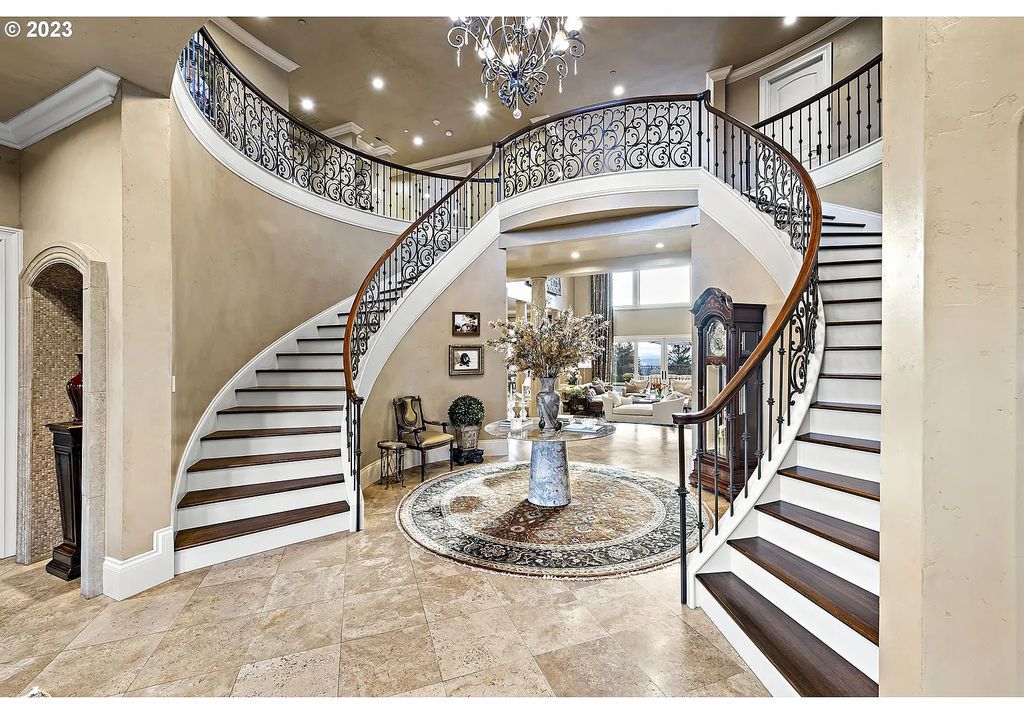 The Estate in Portland is a luxurious home featuring rich amenities, large living spaces and soaring ceilings to offer spectacular sunset and panoramic views now available for sale. This home located at 12955 NW Skyline Blvd, Portland, Oregon; offering 04 bedrooms and 05 bathrooms with 7,956 square feet of living spaces.