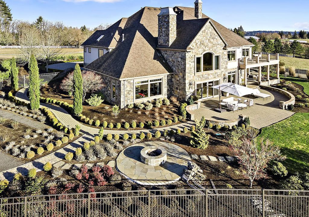 The Estate in Portland is a luxurious home featuring rich amenities, large living spaces and soaring ceilings to offer spectacular sunset and panoramic views now available for sale. This home located at 12955 NW Skyline Blvd, Portland, Oregon; offering 04 bedrooms and 05 bathrooms with 7,956 square feet of living spaces.