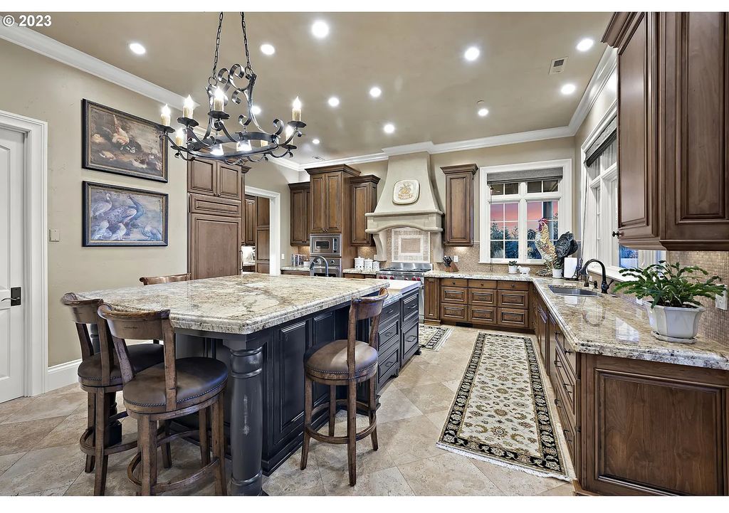 The Estate in Portland is a luxurious home featuring rich amenities, large living spaces and soaring ceilings to offer spectacular sunset and panoramic views now available for sale. This home located at 12955 NW Skyline Blvd, Portland, Oregon; offering 04 bedrooms and 05 bathrooms with 7,956 square feet of living spaces.