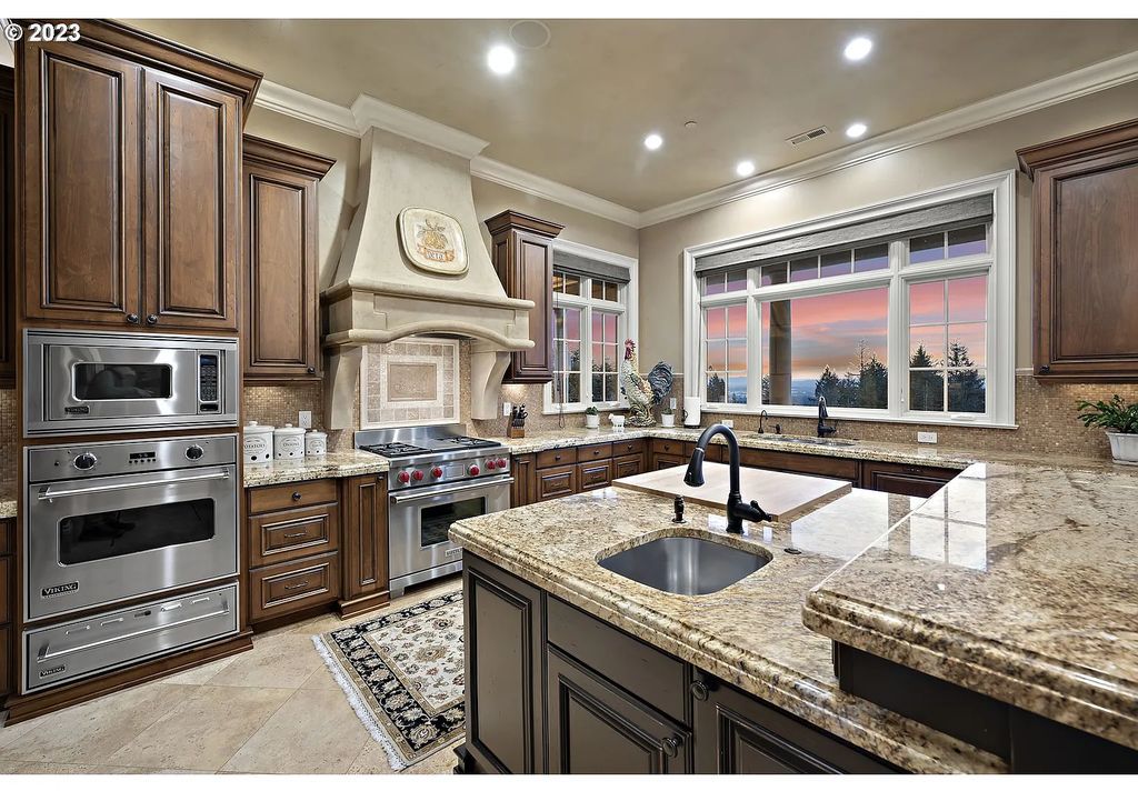The Estate in Portland is a luxurious home featuring rich amenities, large living spaces and soaring ceilings to offer spectacular sunset and panoramic views now available for sale. This home located at 12955 NW Skyline Blvd, Portland, Oregon; offering 04 bedrooms and 05 bathrooms with 7,956 square feet of living spaces.