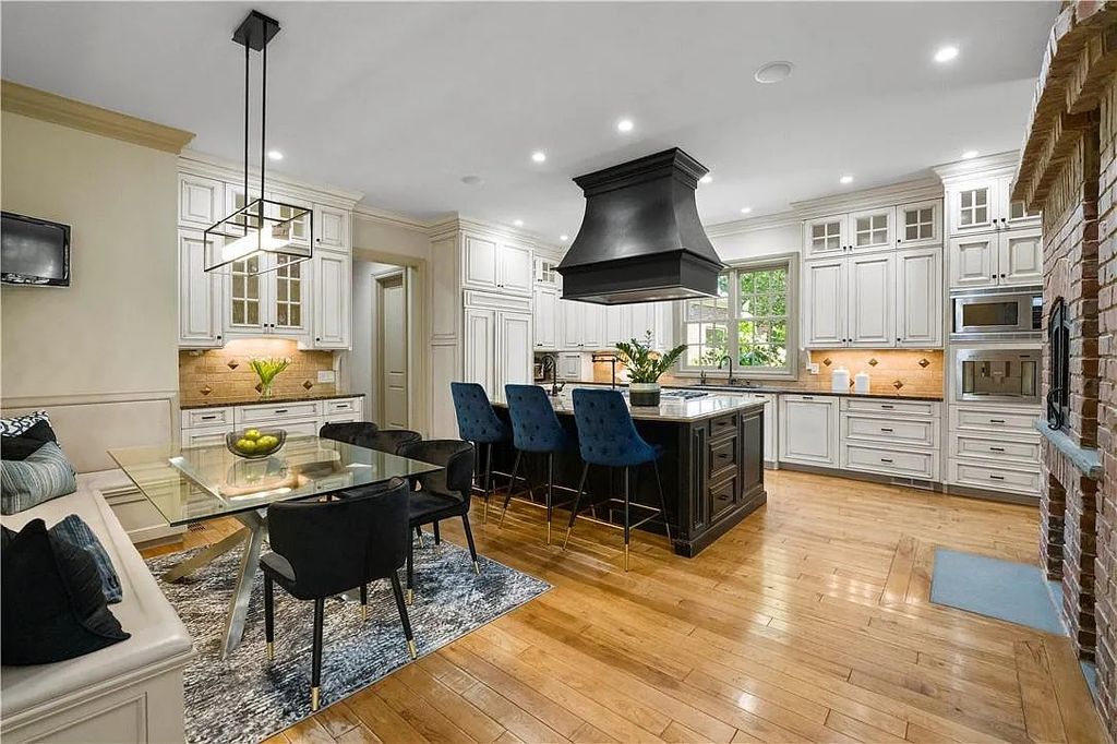 The Estate in Charlotte is a custom-built unique home designed by well-known architect Harry Schrader, now available for sale. This home located at 8402 Fairview Rd, Charlotte, North Carolina