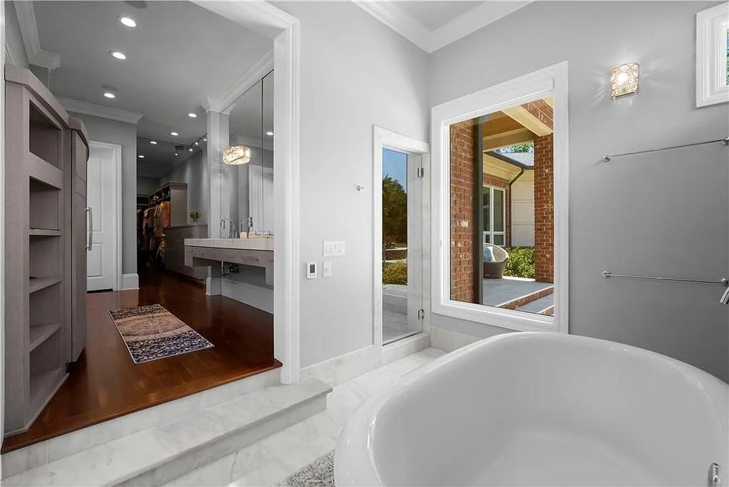 The Estate in Charlotte is a custom-built unique home designed by well-known architect Harry Schrader, now available for sale. This home located at 8402 Fairview Rd, Charlotte, North Carolina