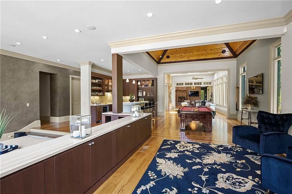 The Estate in Charlotte is a custom-built unique home designed by well-known architect Harry Schrader, now available for sale. This home located at 8402 Fairview Rd, Charlotte, North Carolina