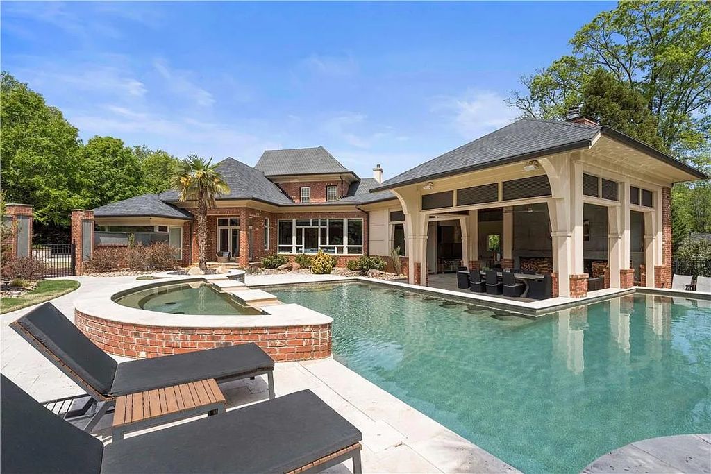 The Estate in Charlotte is a custom-built unique home designed by well-known architect Harry Schrader, now available for sale. This home located at 8402 Fairview Rd, Charlotte, North Carolina