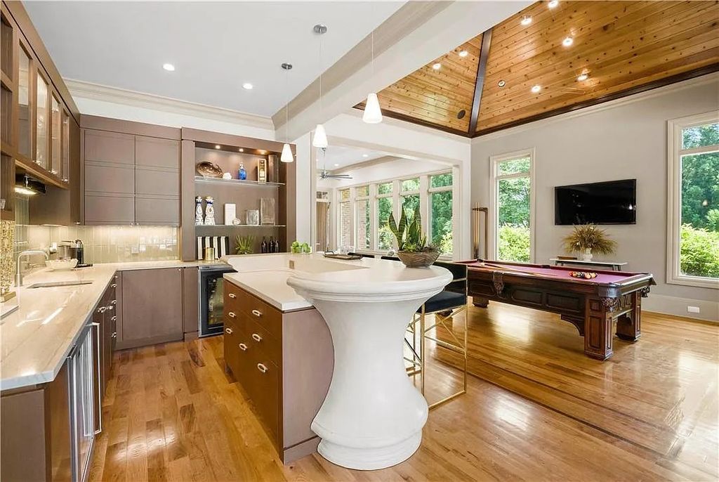 The Estate in Charlotte is a custom-built unique home designed by well-known architect Harry Schrader, now available for sale. This home located at 8402 Fairview Rd, Charlotte, North Carolina