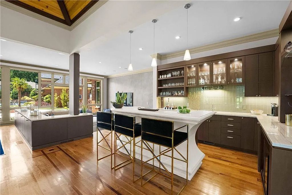 The Estate in Charlotte is a custom-built unique home designed by well-known architect Harry Schrader, now available for sale. This home located at 8402 Fairview Rd, Charlotte, North Carolina