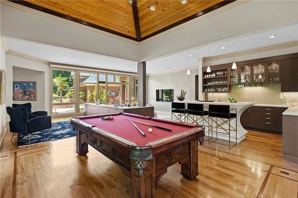 The Estate in Charlotte is a custom-built unique home designed by well-known architect Harry Schrader, now available for sale. This home located at 8402 Fairview Rd, Charlotte, North Carolina