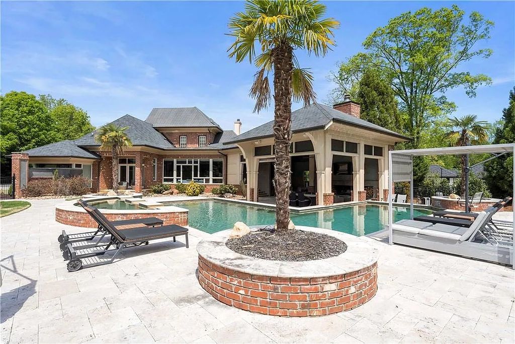 The Estate in Charlotte is a custom-built unique home designed by well-known architect Harry Schrader, now available for sale. This home located at 8402 Fairview Rd, Charlotte, North Carolina