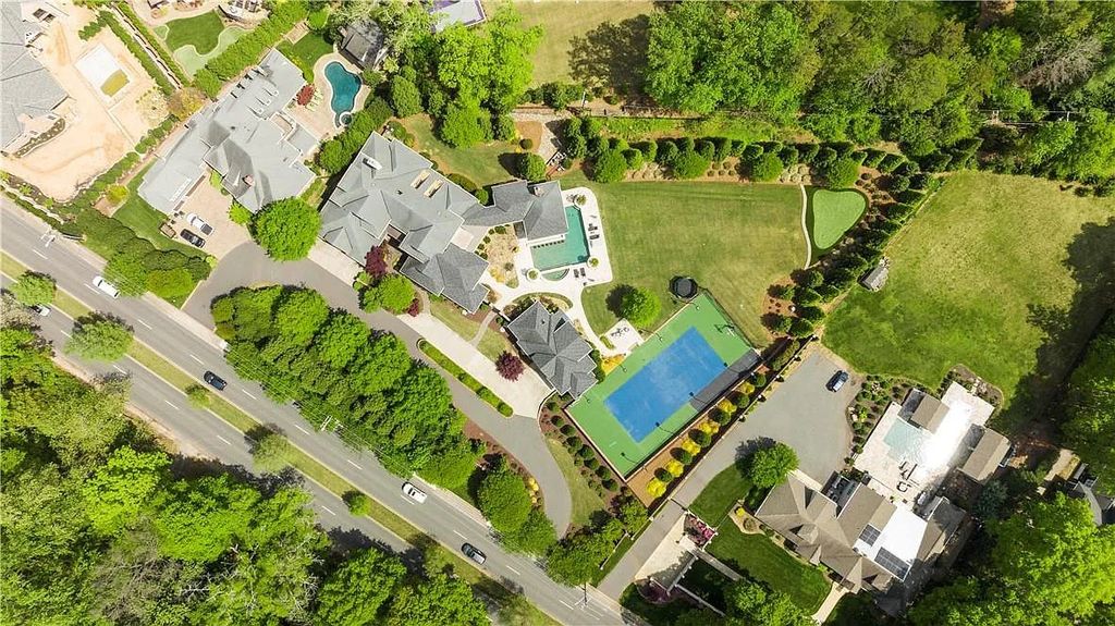 The Estate in Charlotte is a custom-built unique home designed by well-known architect Harry Schrader, now available for sale. This home located at 8402 Fairview Rd, Charlotte, North Carolina