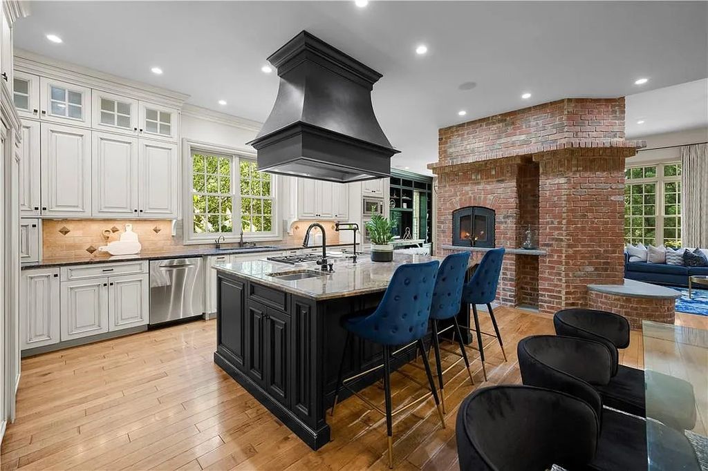 The Estate in Charlotte is a custom-built unique home designed by well-known architect Harry Schrader, now available for sale. This home located at 8402 Fairview Rd, Charlotte, North Carolina