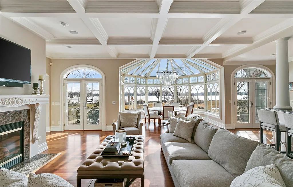 The Estate in Fenton is a luxurious home meticulously built with no detail was spared now available for sale. This home located at 13123 Log Cabin Point, Fenton, Michigan; offering 04 bedrooms and 06 bathrooms with 6,990 square feet of living spaces.