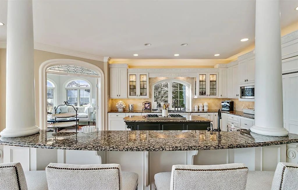 The Estate in Fenton is a luxurious home meticulously built with no detail was spared now available for sale. This home located at 13123 Log Cabin Point, Fenton, Michigan; offering 04 bedrooms and 06 bathrooms with 6,990 square feet of living spaces.
