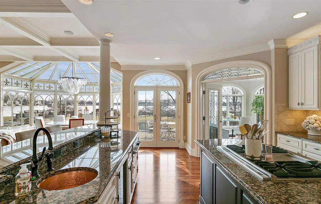 The Estate in Fenton is a luxurious home meticulously built with no detail was spared now available for sale. This home located at 13123 Log Cabin Point, Fenton, Michigan; offering 04 bedrooms and 06 bathrooms with 6,990 square feet of living spaces.