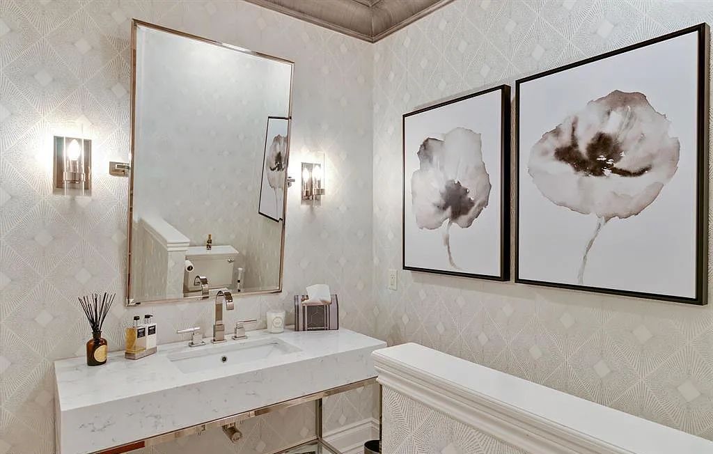 The Estate in Fenton is a luxurious home meticulously built with no detail was spared now available for sale. This home located at 13123 Log Cabin Point, Fenton, Michigan; offering 04 bedrooms and 06 bathrooms with 6,990 square feet of living spaces.