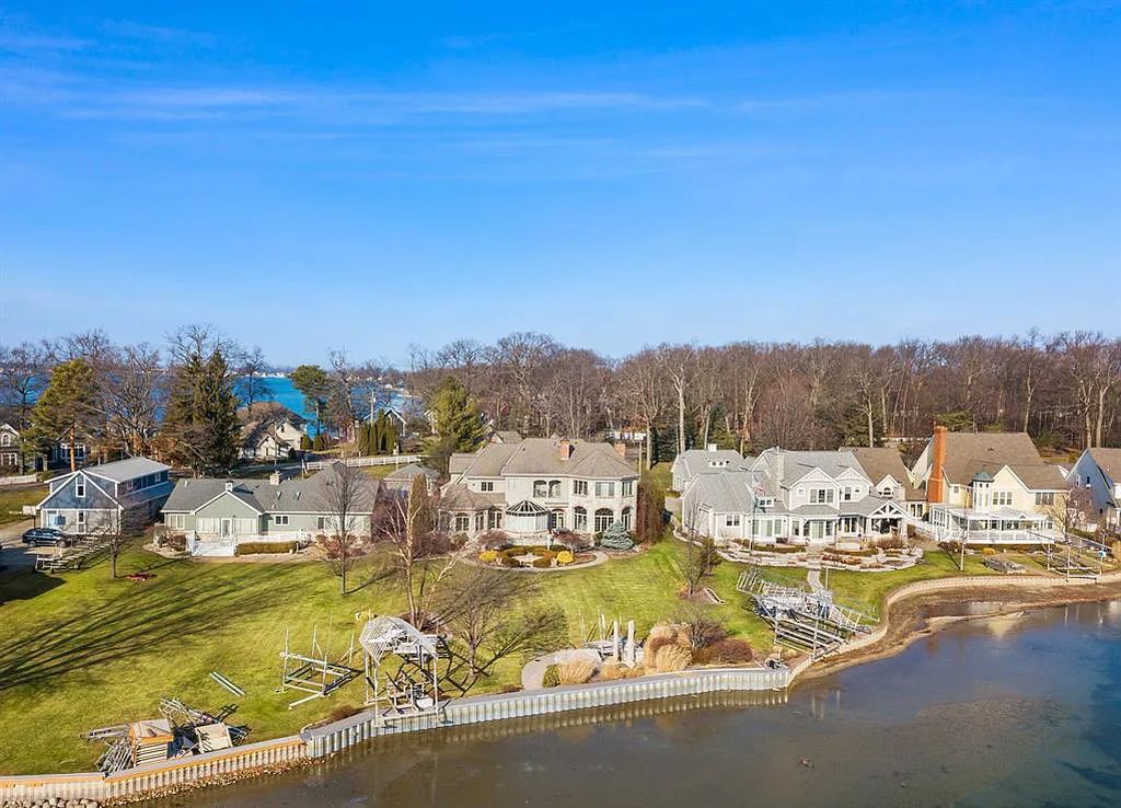 The Estate in Fenton is a luxurious home meticulously built with no detail was spared now available for sale. This home located at 13123 Log Cabin Point, Fenton, Michigan; offering 04 bedrooms and 06 bathrooms with 6,990 square feet of living spaces.