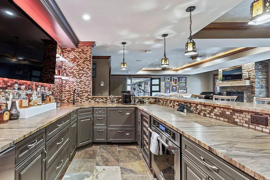The Estate in Delaware is a luxurious home featuring architectural excellence and handcrafted details now available for sale. This home located at 1581 Woodland Hall Dr, Delaware, Ohio; offering 07 bedrooms and 11 bathrooms with 11,787 square feet of living spaces.