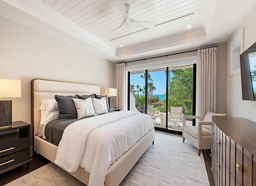 This stunning house located at 2060 Gordon Drive, Naples, Florida, is now available for sale. The newly completed residence is part of a unique, gated beachfront enclave consisting of nine homes, making it a highly coveted property.