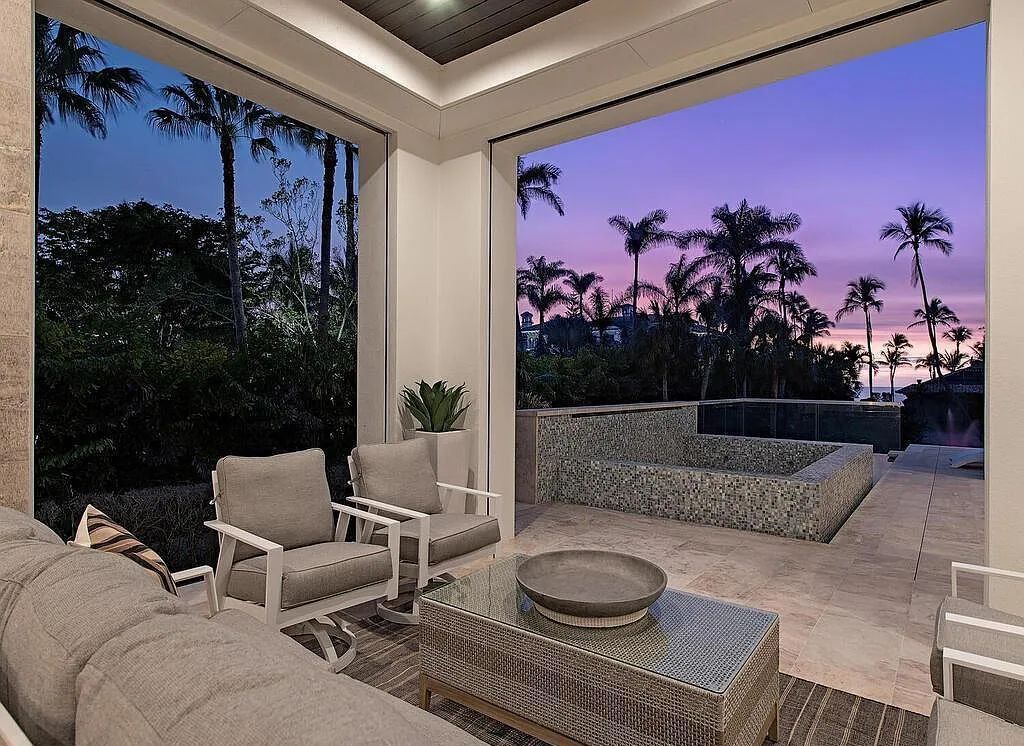 This stunning house located at 2060 Gordon Drive, Naples, Florida, is now available for sale. The newly completed residence is part of a unique, gated beachfront enclave consisting of nine homes, making it a highly coveted property.