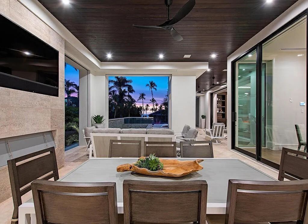 This stunning house located at 2060 Gordon Drive, Naples, Florida, is now available for sale. The newly completed residence is part of a unique, gated beachfront enclave consisting of nine homes, making it a highly coveted property.