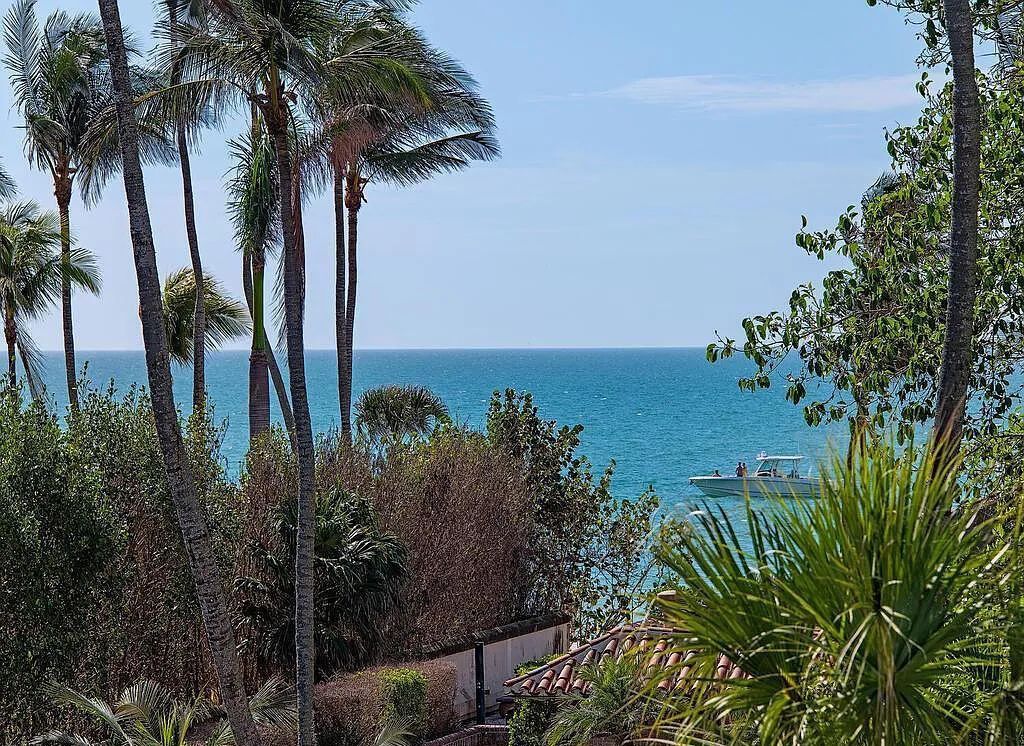 This stunning house located at 2060 Gordon Drive, Naples, Florida, is now available for sale. The newly completed residence is part of a unique, gated beachfront enclave consisting of nine homes, making it a highly coveted property.
