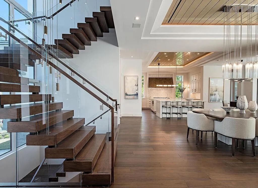 This stunning house located at 2060 Gordon Drive, Naples, Florida, is now available for sale. The newly completed residence is part of a unique, gated beachfront enclave consisting of nine homes, making it a highly coveted property.