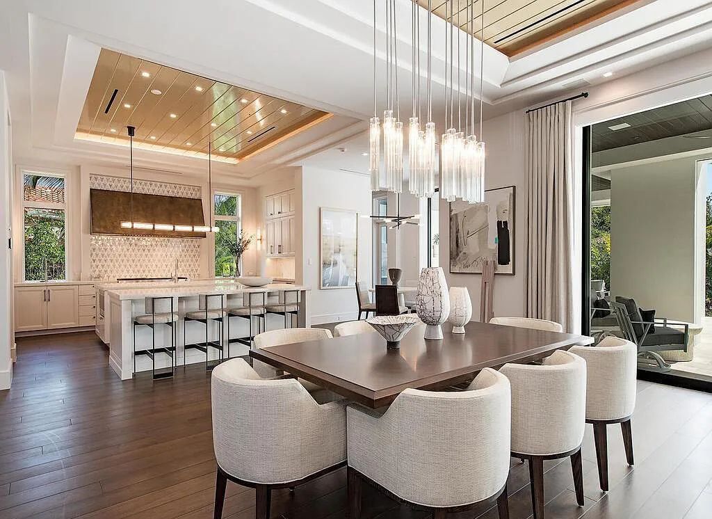 This stunning house located at 2060 Gordon Drive, Naples, Florida, is now available for sale. The newly completed residence is part of a unique, gated beachfront enclave consisting of nine homes, making it a highly coveted property.