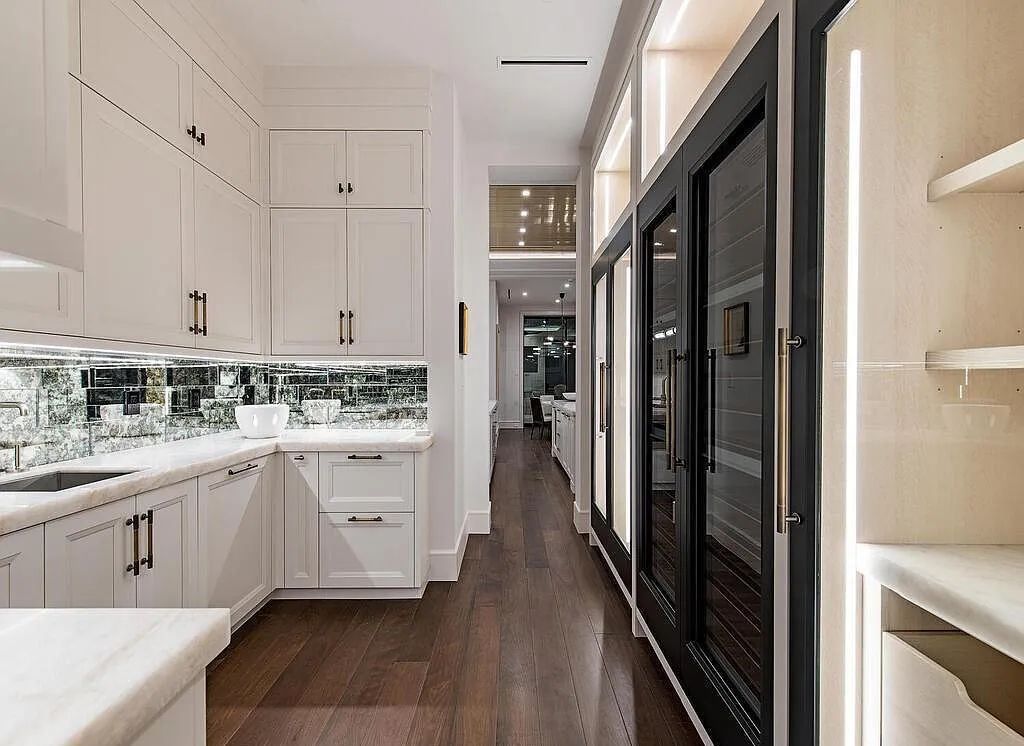 This stunning house located at 2060 Gordon Drive, Naples, Florida, is now available for sale. The newly completed residence is part of a unique, gated beachfront enclave consisting of nine homes, making it a highly coveted property.