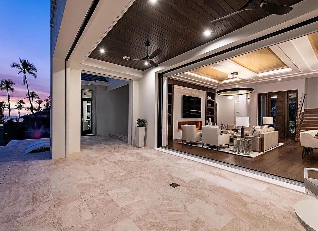 This stunning house located at 2060 Gordon Drive, Naples, Florida, is now available for sale. The newly completed residence is part of a unique, gated beachfront enclave consisting of nine homes, making it a highly coveted property.
