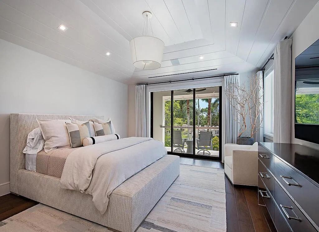 This stunning house located at 2060 Gordon Drive, Naples, Florida, is now available for sale. The newly completed residence is part of a unique, gated beachfront enclave consisting of nine homes, making it a highly coveted property.