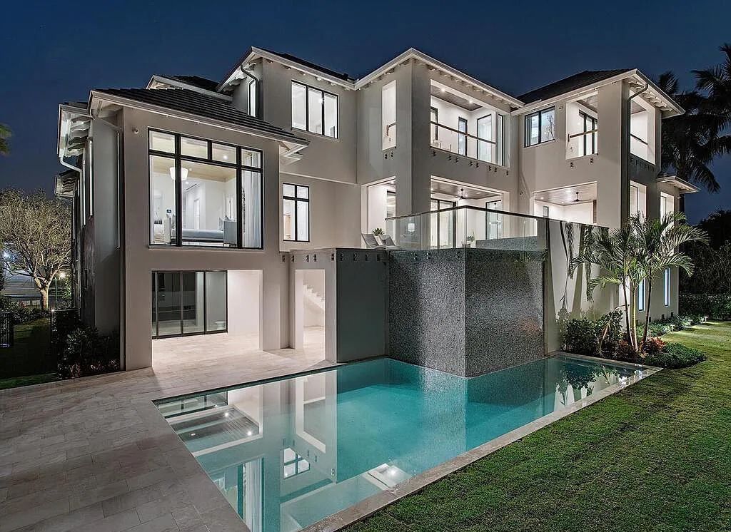 This stunning house located at 2060 Gordon Drive, Naples, Florida, is now available for sale. The newly completed residence is part of a unique, gated beachfront enclave consisting of nine homes, making it a highly coveted property.