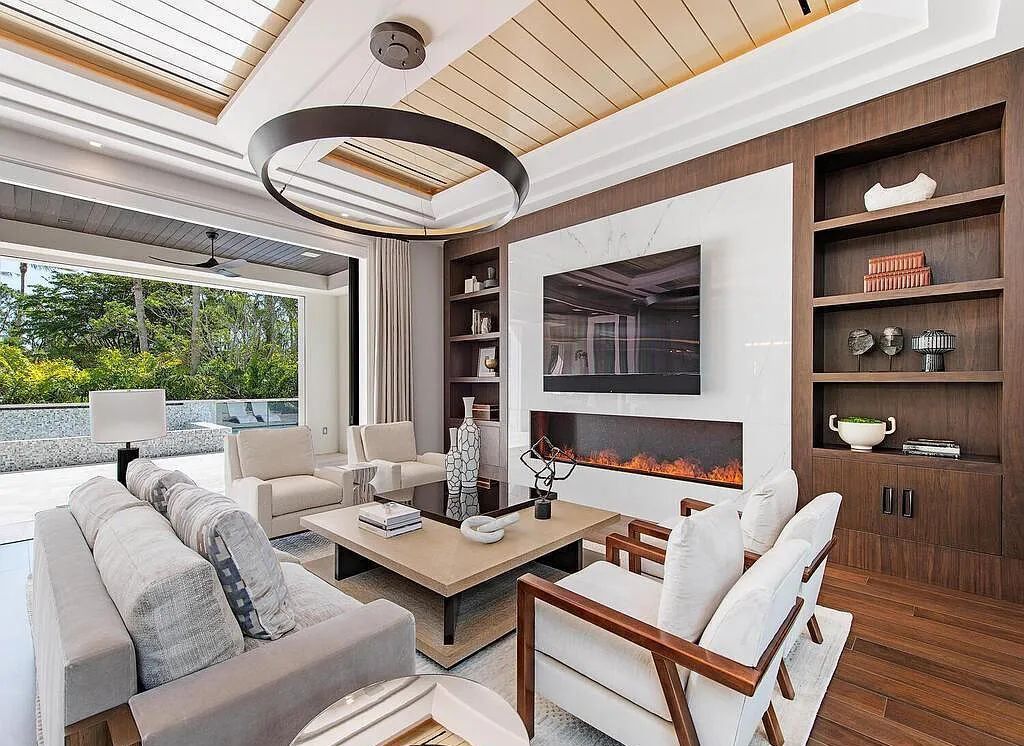 This stunning house located at 2060 Gordon Drive, Naples, Florida, is now available for sale. The newly completed residence is part of a unique, gated beachfront enclave consisting of nine homes, making it a highly coveted property.