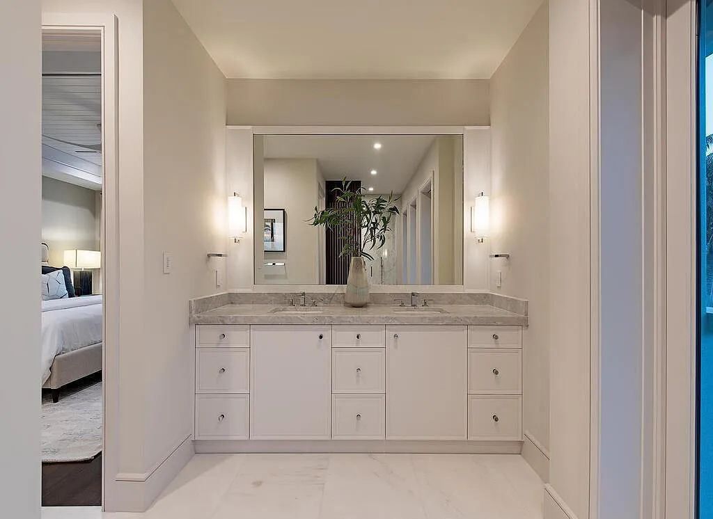 This stunning house located at 2060 Gordon Drive, Naples, Florida, is now available for sale. The newly completed residence is part of a unique, gated beachfront enclave consisting of nine homes, making it a highly coveted property.