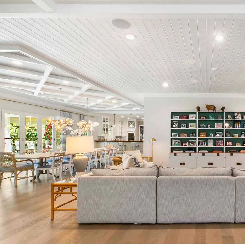 This luxurious 5-bedroom, 6.5-bathroom pool home is located in the Equestrian Club Estates in 14310 Calypso Lane, Wellington, Florida. The house offers 7,173 square feet of living space on a spacious 0.49-acre lot. Built-in 2000, the property has been completely renovated with high-end finishes throughout.