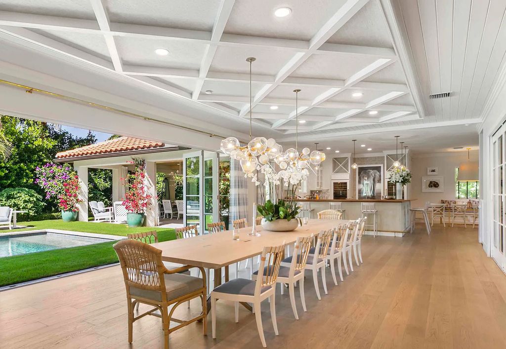 This luxurious 5-bedroom, 6.5-bathroom pool home is located in the Equestrian Club Estates in 14310 Calypso Lane, Wellington, Florida. The house offers 7,173 square feet of living space on a spacious 0.49-acre lot. Built-in 2000, the property has been completely renovated with high-end finishes throughout.