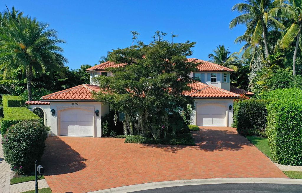 This luxurious 5-bedroom, 6.5-bathroom pool home is located in the Equestrian Club Estates in 14310 Calypso Lane, Wellington, Florida. The house offers 7,173 square feet of living space on a spacious 0.49-acre lot. Built-in 2000, the property has been completely renovated with high-end finishes throughout.