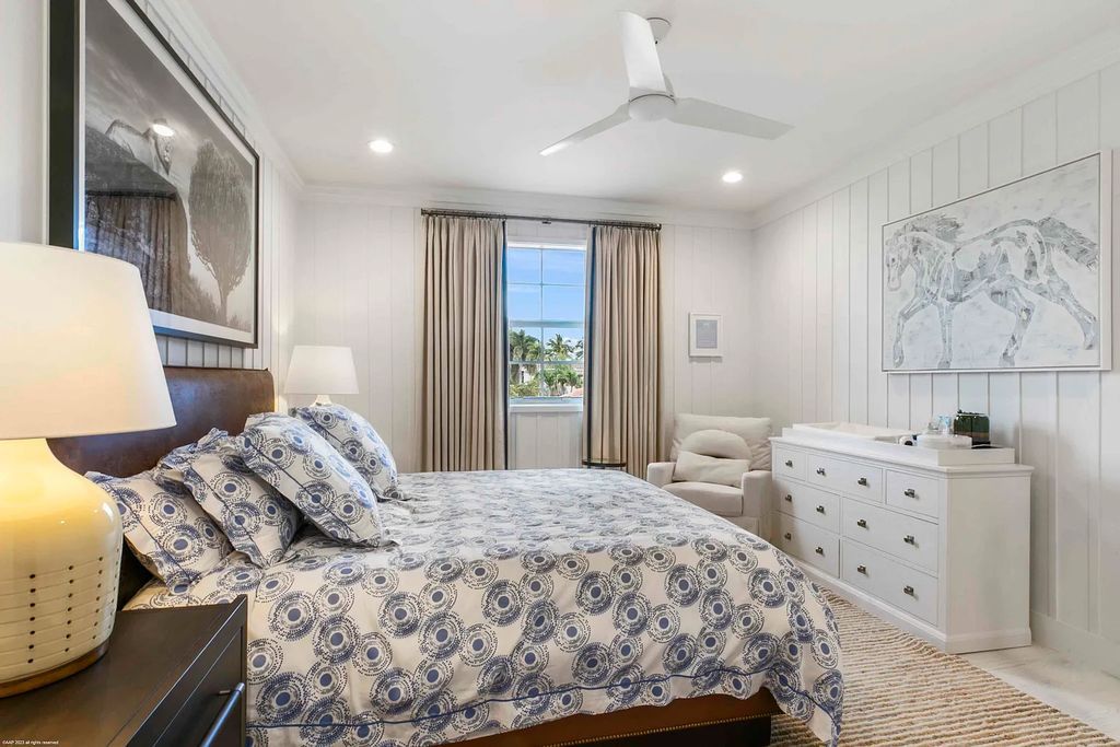 This luxurious 5-bedroom, 6.5-bathroom pool home is located in the Equestrian Club Estates in 14310 Calypso Lane, Wellington, Florida. The house offers 7,173 square feet of living space on a spacious 0.49-acre lot. Built-in 2000, the property has been completely renovated with high-end finishes throughout.