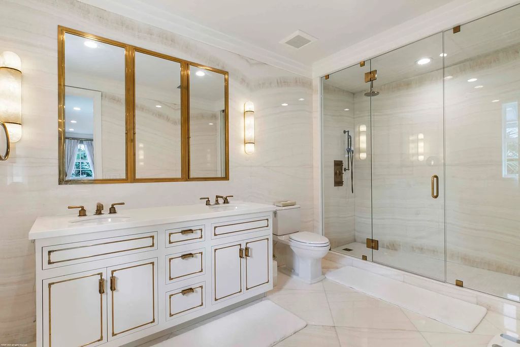 This luxurious 5-bedroom, 6.5-bathroom pool home is located in the Equestrian Club Estates in 14310 Calypso Lane, Wellington, Florida. The house offers 7,173 square feet of living space on a spacious 0.49-acre lot. Built-in 2000, the property has been completely renovated with high-end finishes throughout.